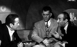 Humphrey Bogart, Mike Lane e Carlos Montalbán in Il colosso d'argilla