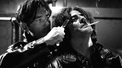 Clive Owen e Benicio Del Toro in Sin City